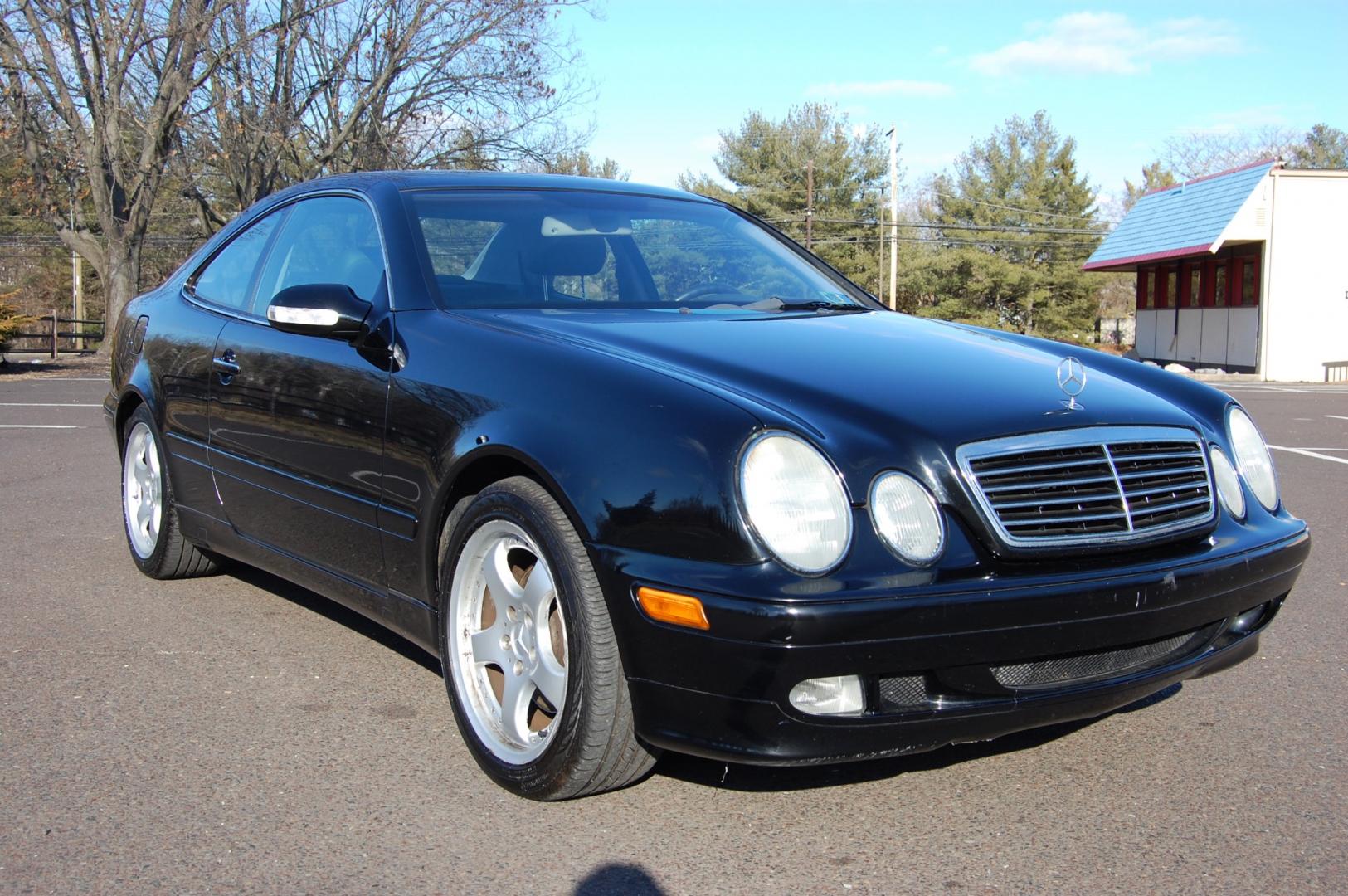 2000 Black /Black Mercedes-Benz CLK-Class (WDBLJ65G3YF) with an 3.2 Liter engine, Automatic transmission, located at 6528 Lower York Road, New Hope, PA, 18938, (215) 862-9555, 40.358707, -74.977882 - Here is a good looking, good running 2000 Mercedes Benz CLK 320 Coupe. 3.2 Liter V6 engine, auto trans, keyless entry, power moonroof, windows, mirrors, central locking system, rear sun shade, dual power seats in leather, AM/FM/6 disc CD in trunk, alloy wheels, 4 good tires . Only 90k original mi - Photo#3